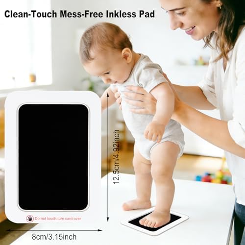 Newborn infant foot being gently pressed onto the mess free clean touch inkless pad.