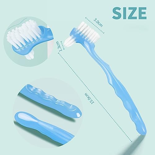 Four pieces of small manual denture toothbrushes in multiple colors arranged together.