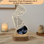 Close up view of the engraved acrylic pregnancy keepsake frame from USA