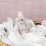 Concentrated non aerosol fabric refresher with Sweet Grace passion fruit scent