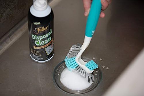 Fuller Brush Garbage Disposal Cleaner bottle next to a kitchen sink