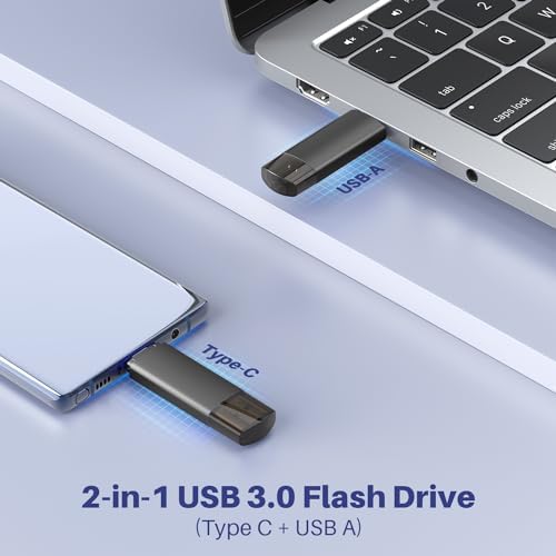 JOIOT 2-in-1 portable thumb drive with protective caps attached to a keychain showing its compact travel size.