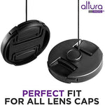 Sleek black camera lens cap tether leash attached to a DSLR camera lens barrel setup