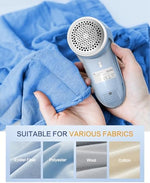 Full kit view of the Beautural lint remover including the charging cable and spare blade.