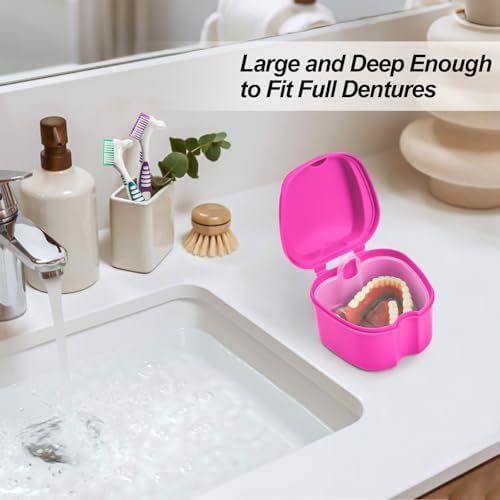 Denture soaking container with removable strainer basket