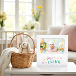 White wooden Easter milestone frame displaying a four by six inch infant photo