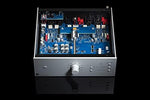 Pro-Ject discrete component phono preamplifier showcasing compact steel chassis construction.