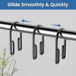 Close up view of the double hook architecture holding a decorative curtain on one side and a liner on the other.