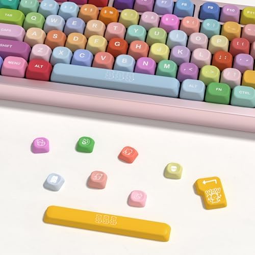 The complete one hundred thirty nine piece custom keycap pack arranged neatly with the included keycap puller accessory.
