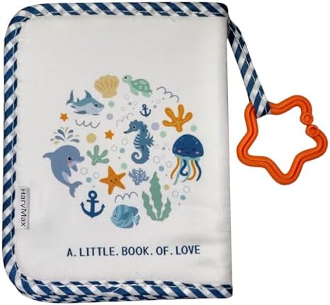 Close up view of the star shaped teething pendant attached to the HarvMax fabric photo album.