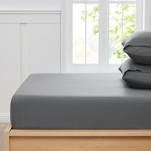 Fitted sheet showing secure elastic edges on a mattress