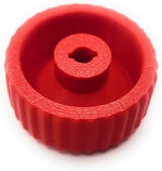 Close up of red replacement knob with ribbed grip pattern