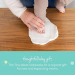 Unboxed view of the baby print kit showing clay, rolling pin, and shaping tools