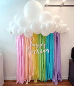 Full set of eight individual pastel color crepe paper rolls arranged neatly to show the assorted wedding color palette.