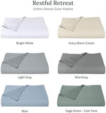 Premium white flat top sheet draped over a large master bedroom bed
