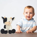 Back view of the BSVOME cow plush toy showcasing the detailed spots and high quality fabric construction.