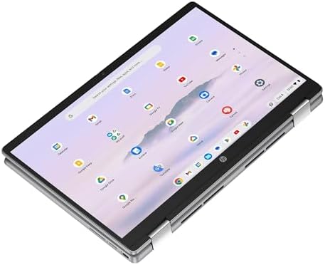 HP 14b x360 two in one laptop folded into tablet configuration highlighting slim silver chassis.