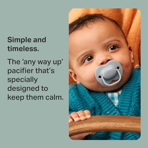 Symmetrical orthodontic silicone baglet on a Tommee Tippee brand pacifier blue pacifier