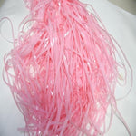 Adhesive backing demonstration on the top of the BRAVESHINE pastel pink party streamers