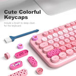 MOWUX pink heart keyboard showing foldable ergonomic stand and anti slip bottom pads