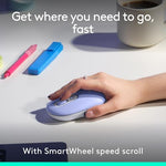 Logitech purple and white aesthetic peripheral bundle arranged neatly on an office desk
