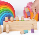 Close up of colored and natural wooden puppets