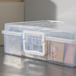 Novelinks storage box being carried by the integrated handle