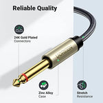 Ugreen Y-splitter cable connected to laptop and professional speakers