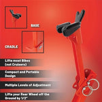 Compact orange collapsible motorcycle kickstand jack tool showing pivoting base.