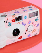 Aesthetic bachelorette photo supplies camera featuring cute butterfly and cowboy boot graphics on the outer shell.