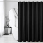 Gibelle seventy two inch square black textured curtain draped elegantly next to a white bathtub.