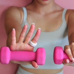 Side angle view of the pink silicone smart ring shield for scratch prevention.