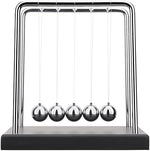 Close up of polished steel balls on Newton cradle gadget
