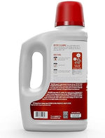 Hoover 2X concentrated carpet shampoo bottle showing Fresh Meadows scent label.