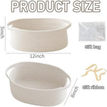 Two pack of white handwoven decorative gift baskets arranged on a wooden closet shelf for organization