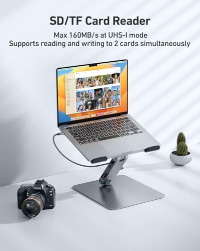 Benfei heavy duty laptop elevator stand supporting a professional MacBook workstation setup.