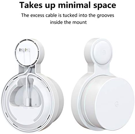 White plastic wall hanger securely holding a round plug mesh router inside an Indian home setting