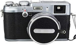 Jw camera lens cap protector installed on a silver Fujifilm X100VI camera setup