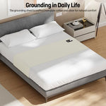 Beige earthing half sheet runner laid crosswise on a mattress displaying universal fitment