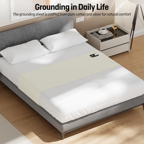 Beige earthing half sheet runner laid crosswise on a mattress displaying universal fitment