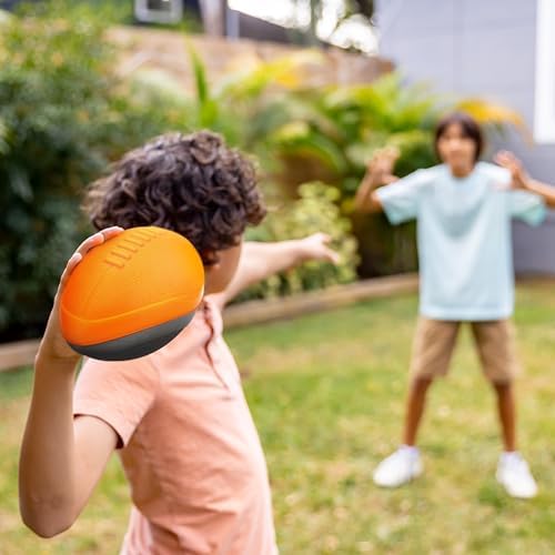 A lifestyle view showcasing the soft foam build of the junior football ideal for family playtime