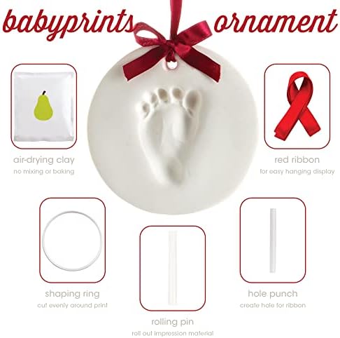 Included tools inside the Pearhead baby footprint kit with rolling pin and shaping ring