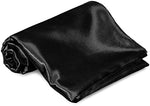 Close up texture of silky smooth homiest black satin top sheet