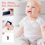 Newborn infant foot pressing against the mess free inkless frame