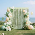 Wedding and bridal shower entrance decorated with light green foil streamers