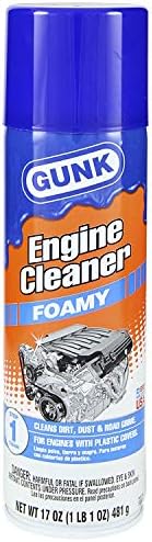 Thick clinging foam action of Gunk engine degreaser applied to a modern vehicle engine bay.