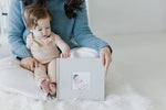 Close up view of the durable acid free pages inside the Pearhead baby photo book.