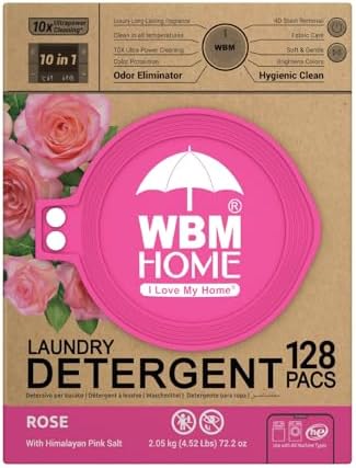 Close up of a single pink WBM laundry detergent pod with rose extracts.