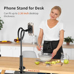Arctiiro cell phone clamp mount holding an ipad mini above a desk setup