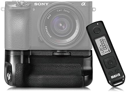 Meike mirrorless camera battery grip showing gold-plated electronic connection pins and secure locking wheel mount